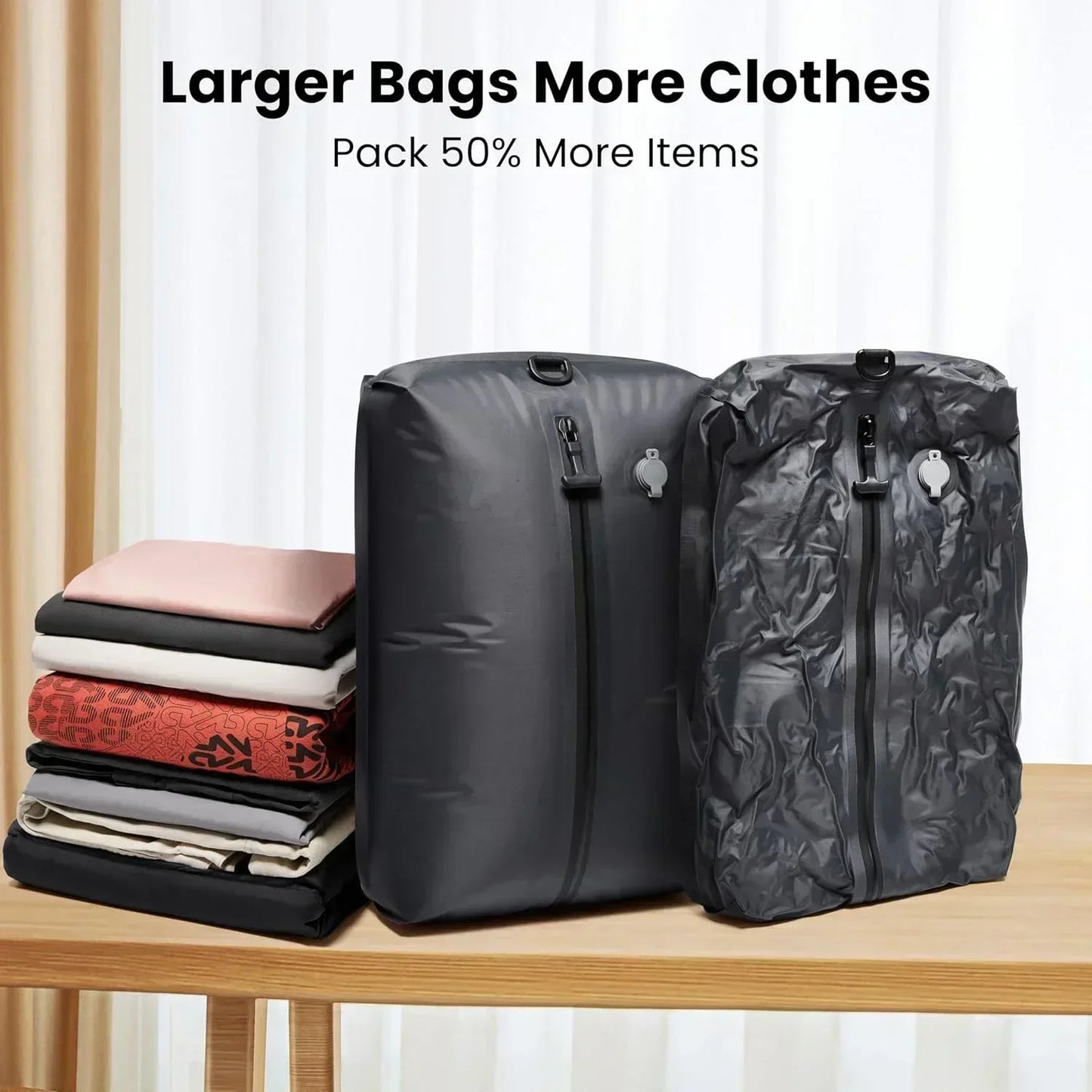 black compression bags showing transition on a wooden surface with text about larger bags packing more clothes.